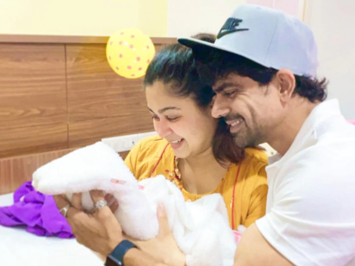 Ankit with his child and Wife
